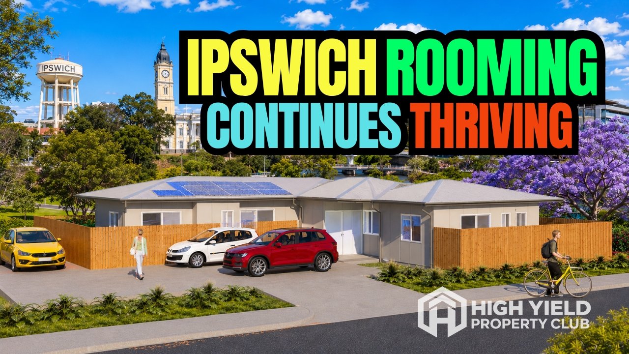 facade of a modern rooming house with Ipswich cityscape as background