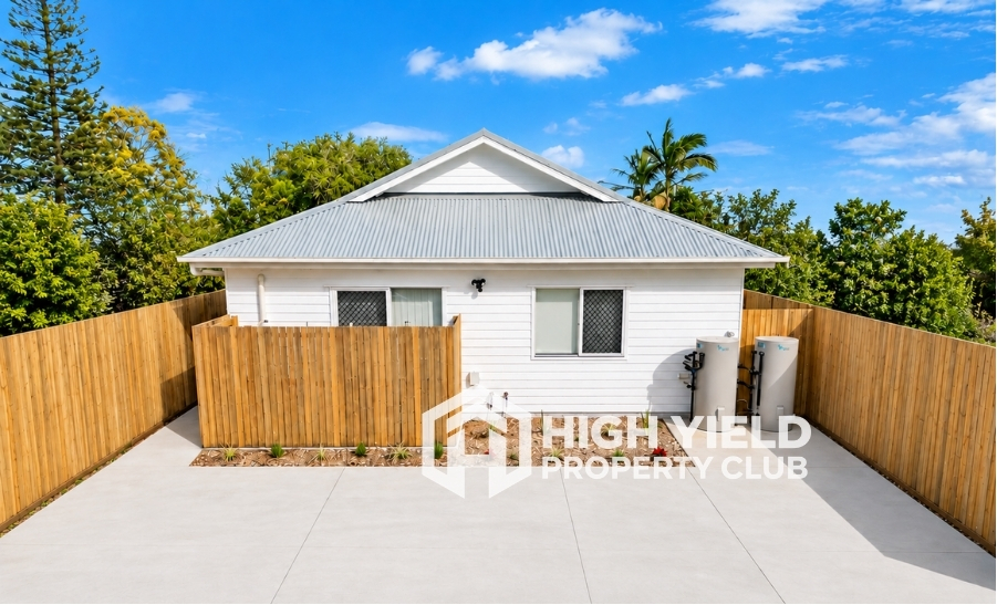 facade of a modern rooming house, best place to buy investment property