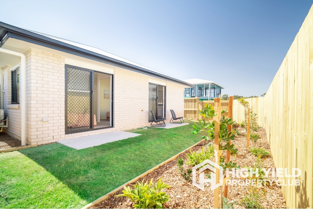 sunny patio in a modern rooming house, a rental property