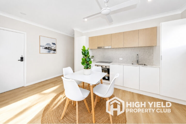 spacious common area with kitchen and dining in a co-living Brisbane Australia property