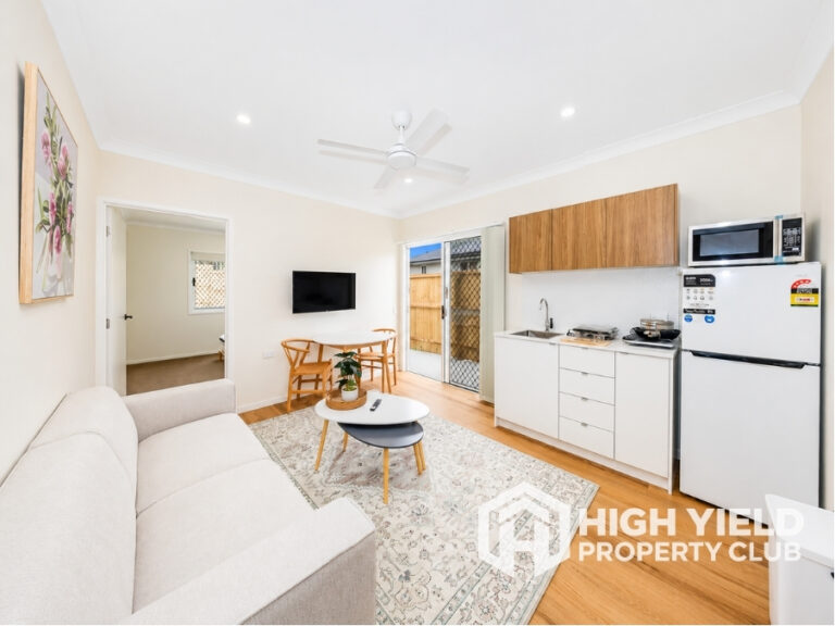 private microapartment with lounge, dining, and kitchenette in a modern rooming house