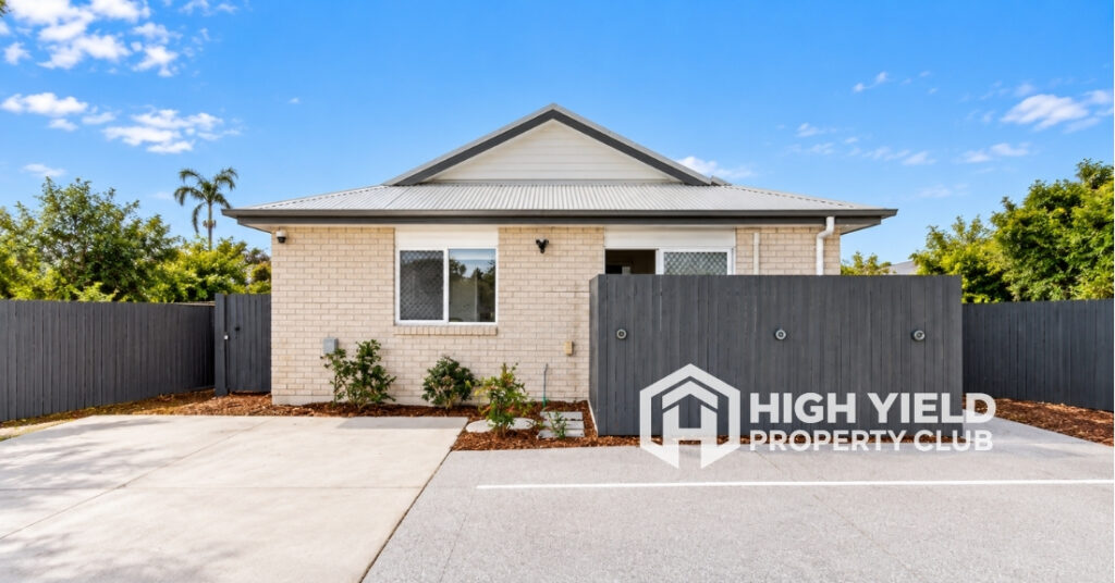 facade of a modern rooming house for sale in Brisbane